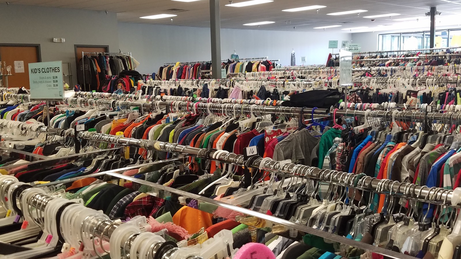 Long rows of colorful clothing at the Goodwill store in Oak Ridge