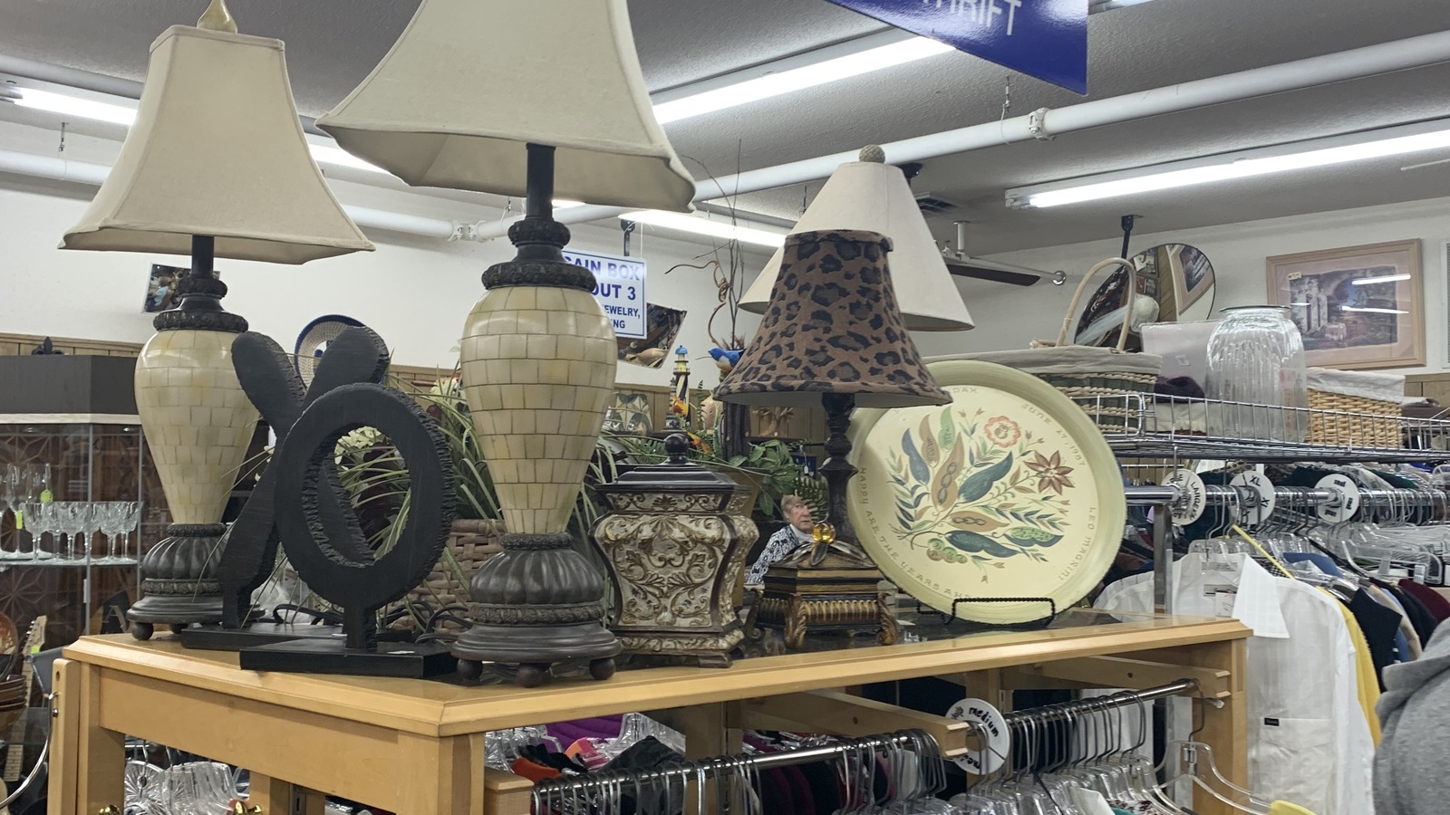 Clothing racks and housewares inside The Bargain Box on Hilton Head Island