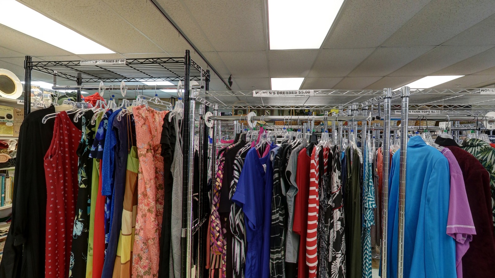 Colorful clothing racks inside United Church of Christ Thrift Shop in New Smyrna Beach