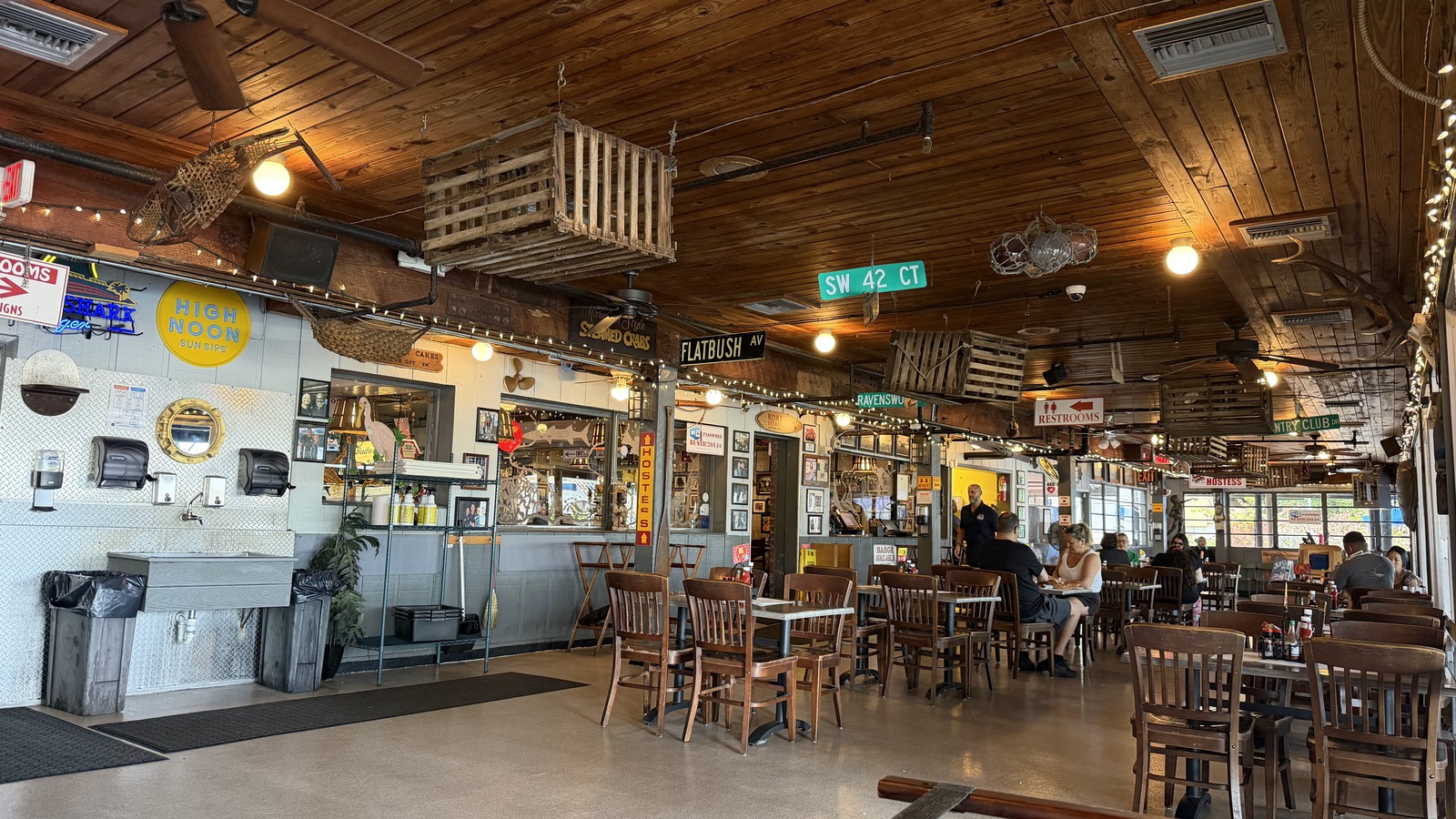 Wood-beamed dining room inside Rustic Inn Crabhouse in Fort Lauderdale