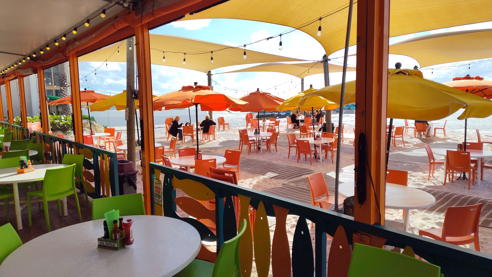 Open-air beachfront patio at Frenchy's Rockaway Grill on Clearwater Beach