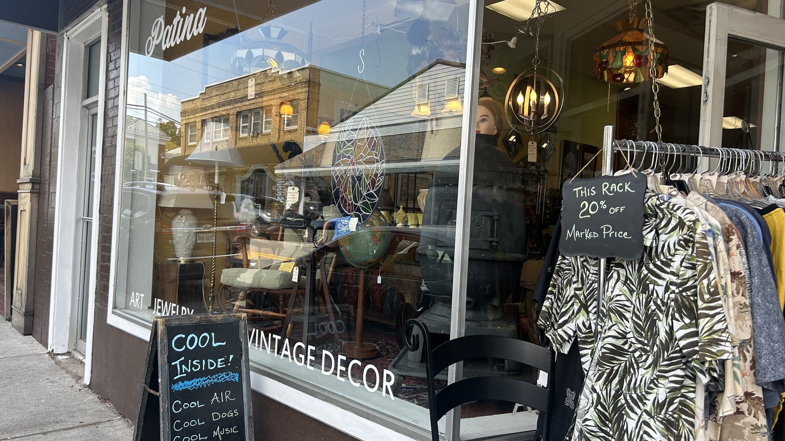 Vintage clothing and decor displayed at the Patina storefront in downtown Lewisburg