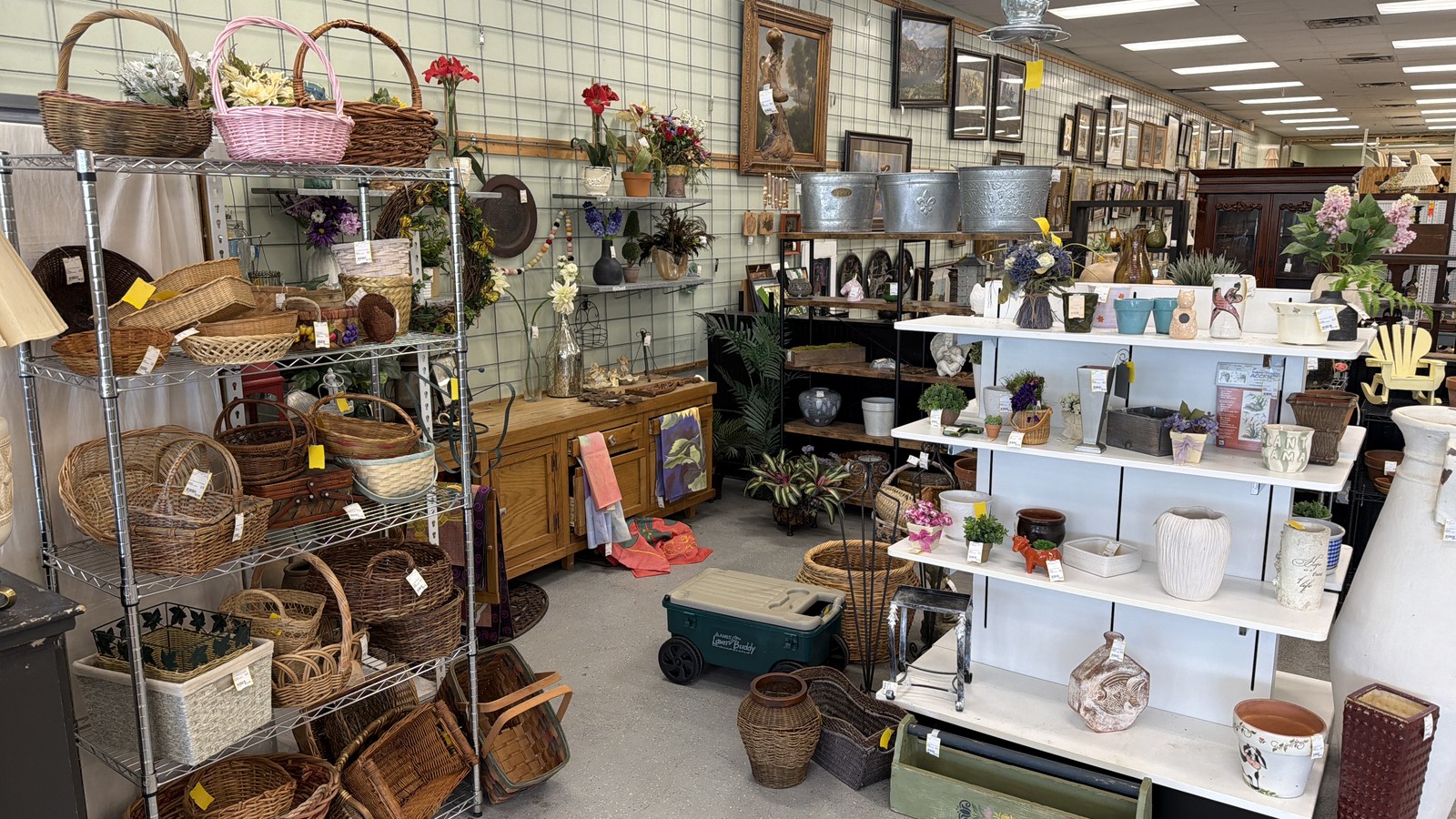 Furniture, mirrors, lamps, and decor arranged inside Patina Interiors in Covington