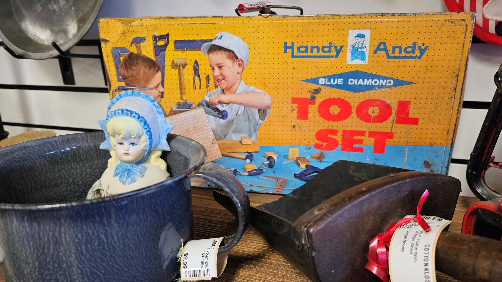 Vintage toy set and decorative finds displayed at Cotton Kloset in Parker