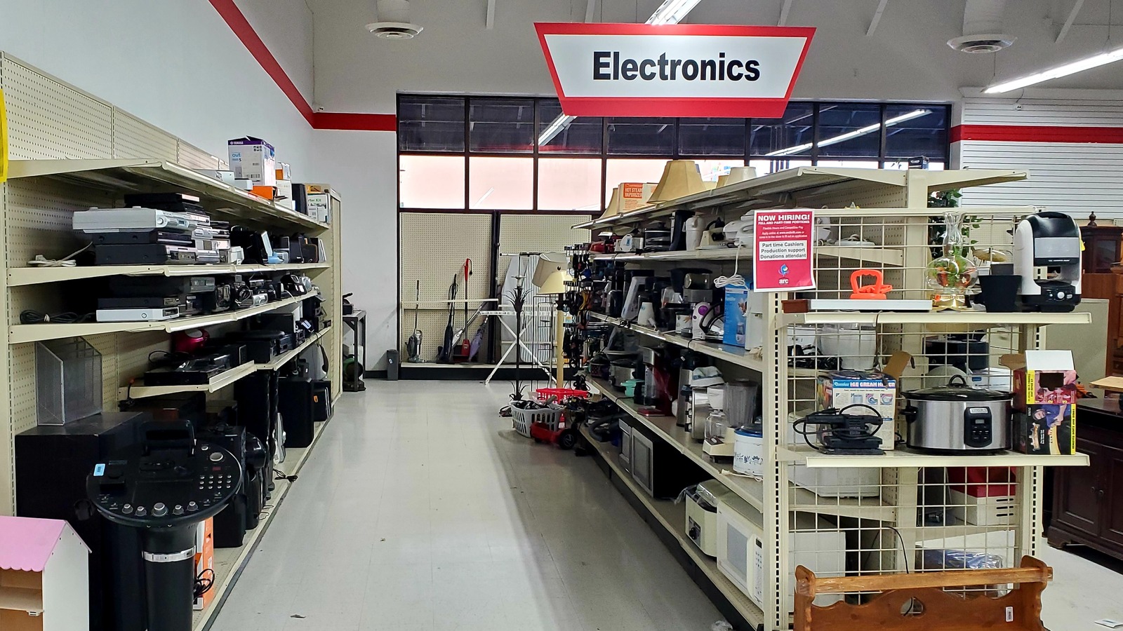 Organized electronics aisle at arc Thrift Stores near Parker