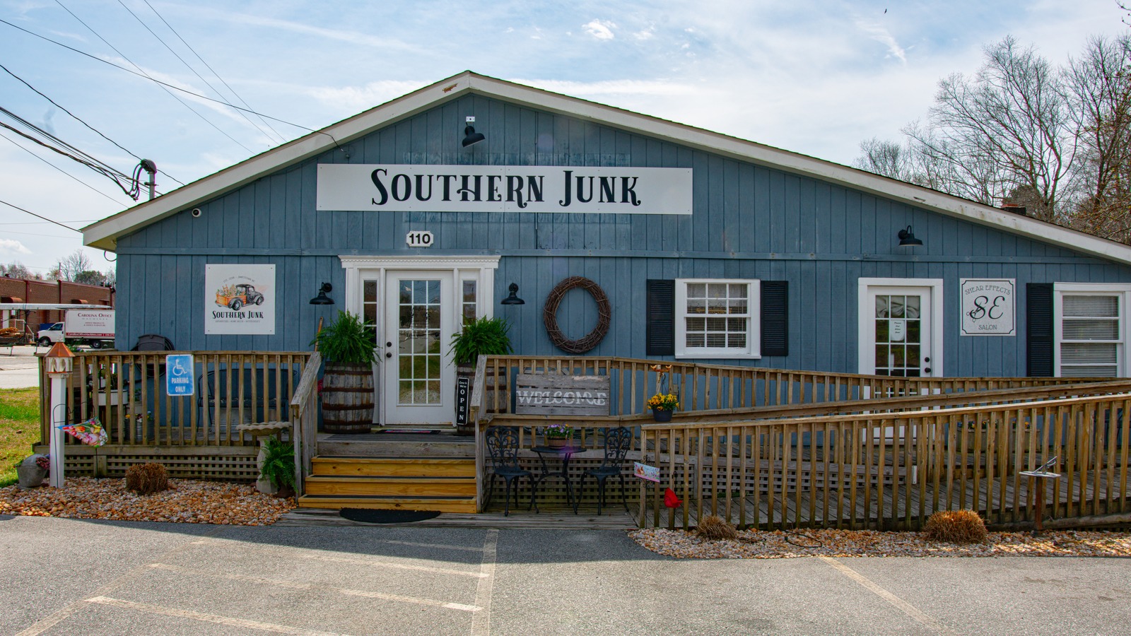 Blue Southern Junk storefront with a porch display in Jamestown near High Point