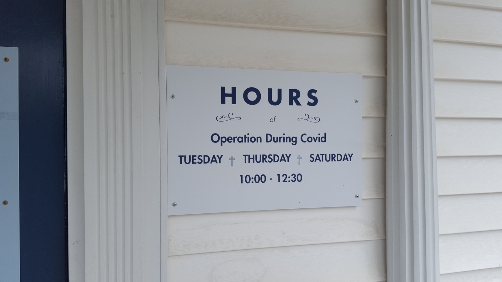 Entrance sign at Outreach Thrift Center in Jamestown near High Point