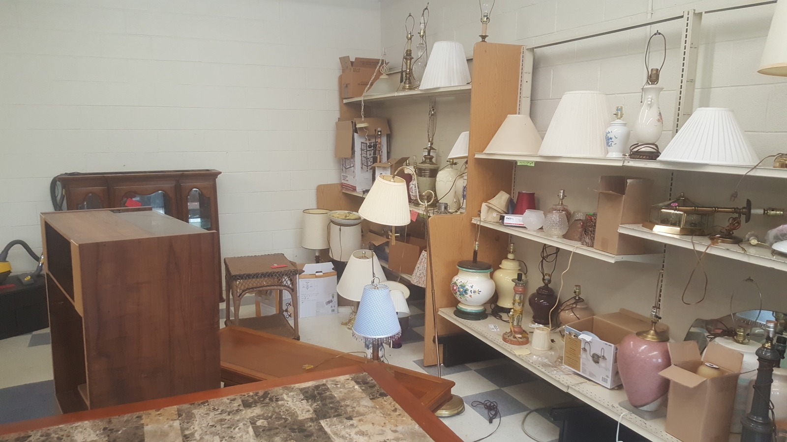 Furniture, lamps, and decorative pieces inside Blessingdales Thrift Store near High Point