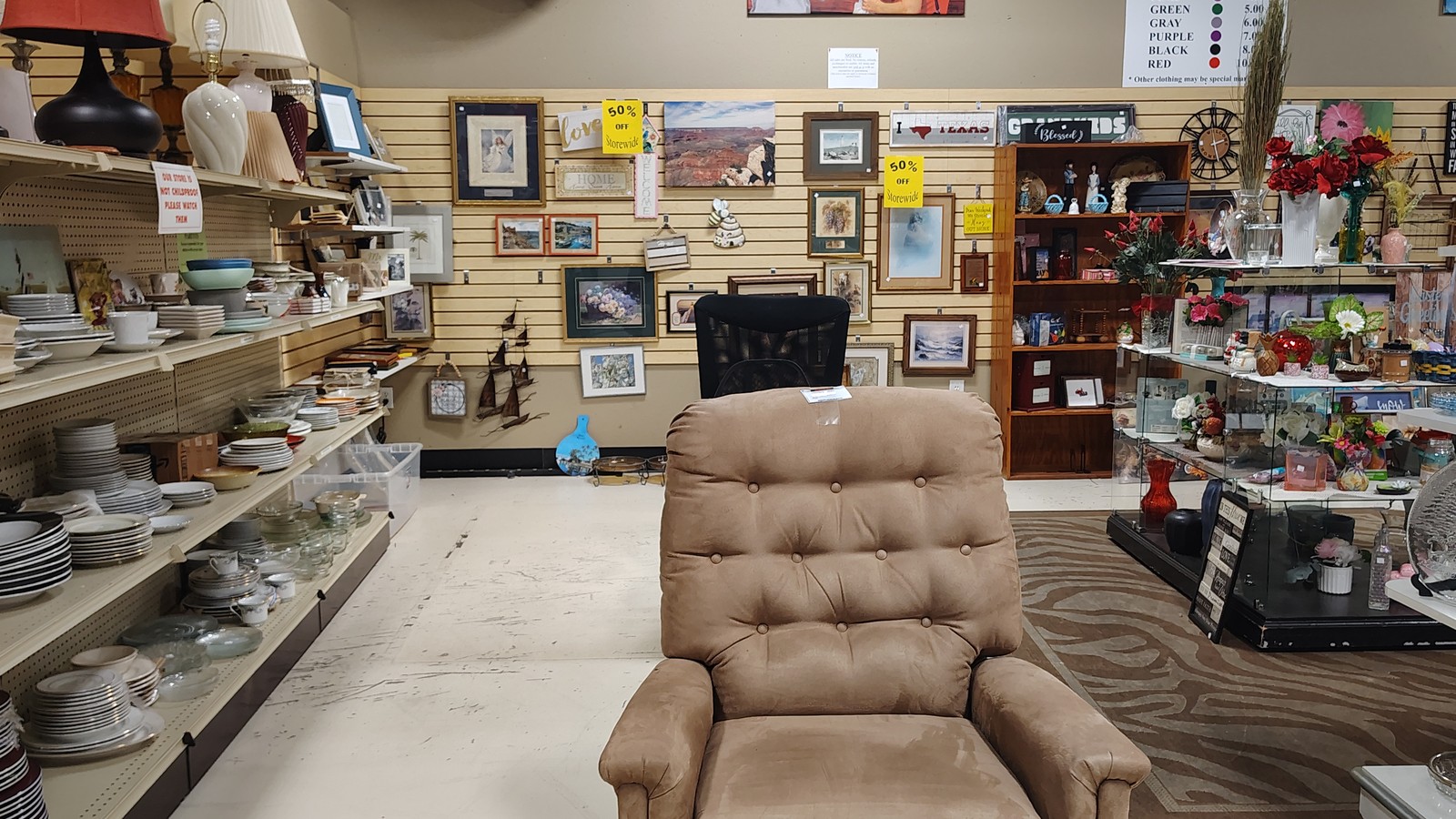 Furniture, framed art, and decor at Renewed Thrift Store in Lake City