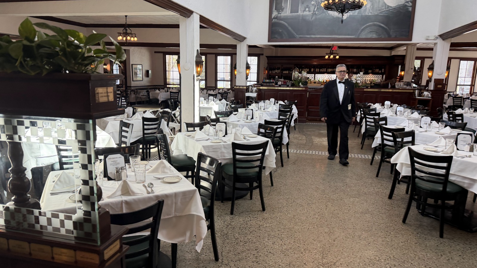 White-tablecloth main dining room inside Joe's Stone Crab in Miami Beach