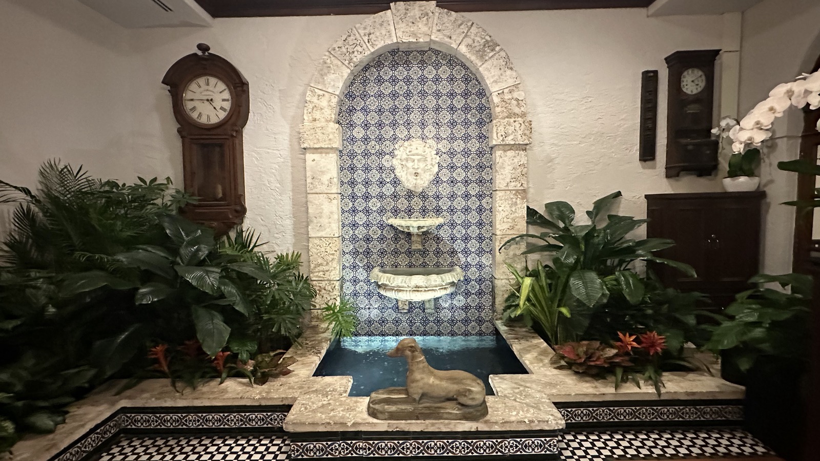 Tiled fountain and checkerboard floor details inside Joe's Stone Crab