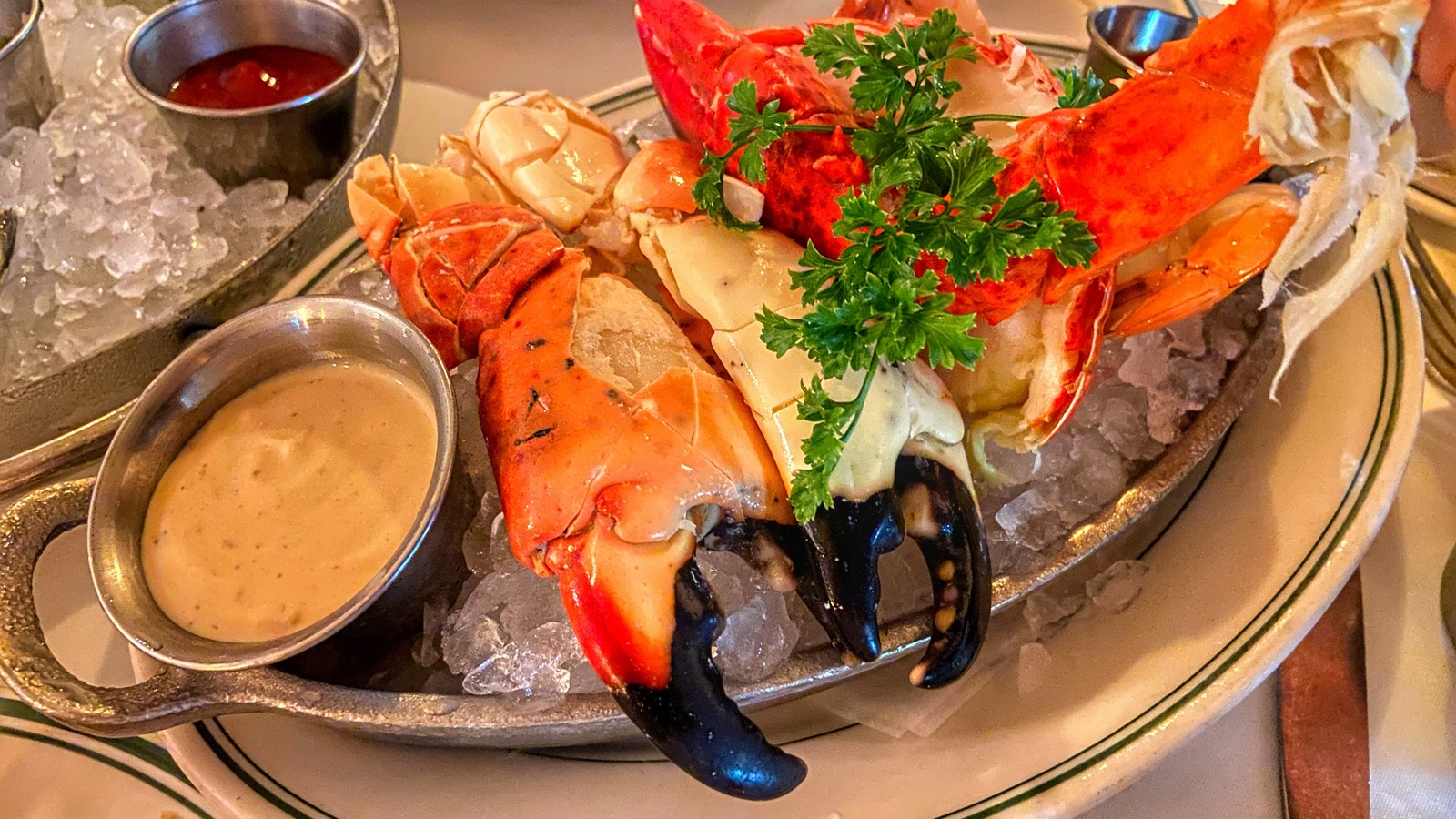 Chilled cracked stone crab claws with mustard sauce at Joe's Stone Crab