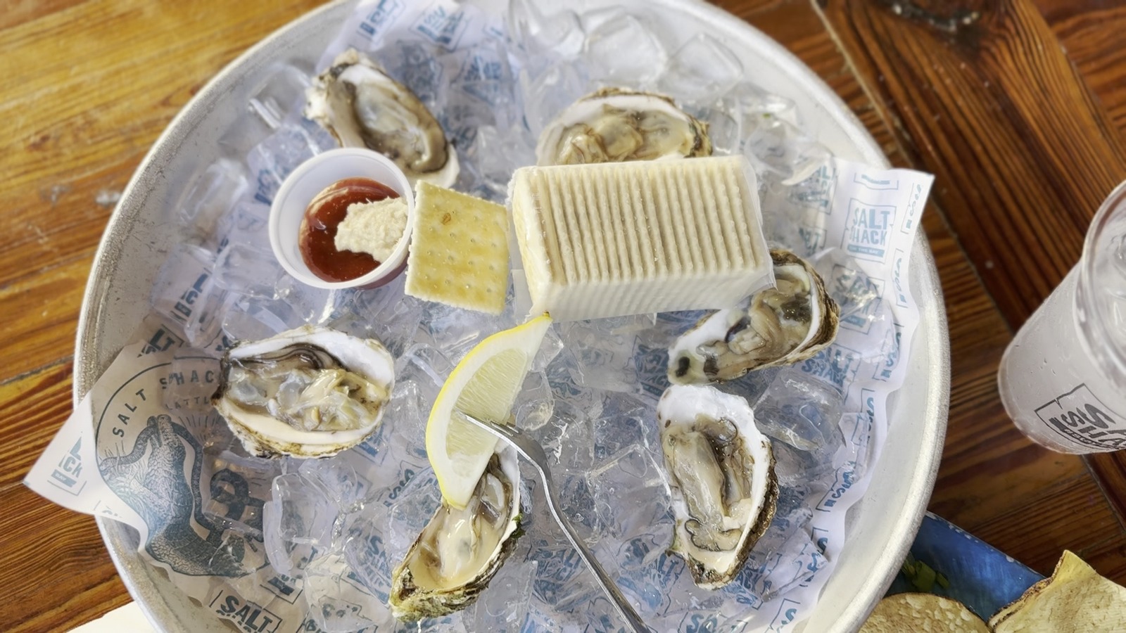 Tray of raw oysters on ice at Salt Shack On The Bay