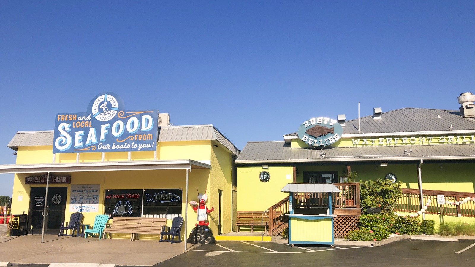 Rusty Bellies and Pelican Point Seafood side by side on Dodecanese Boulevard in Tarpon Springs