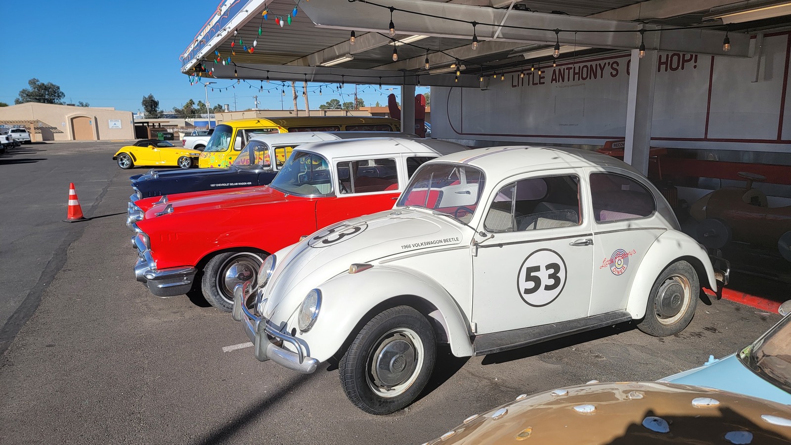 Classic cars lined up in the carhop lane at Little Anthony's Diner