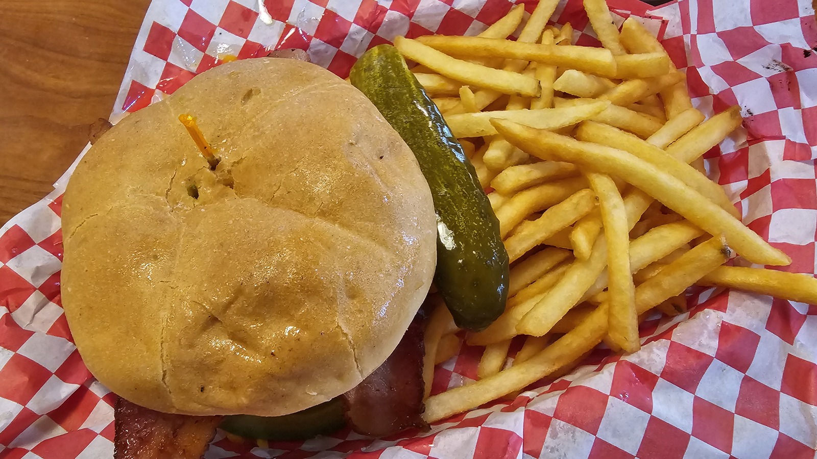 Burger basket with fries and pickle at Galaxy Diner in Flagstaff