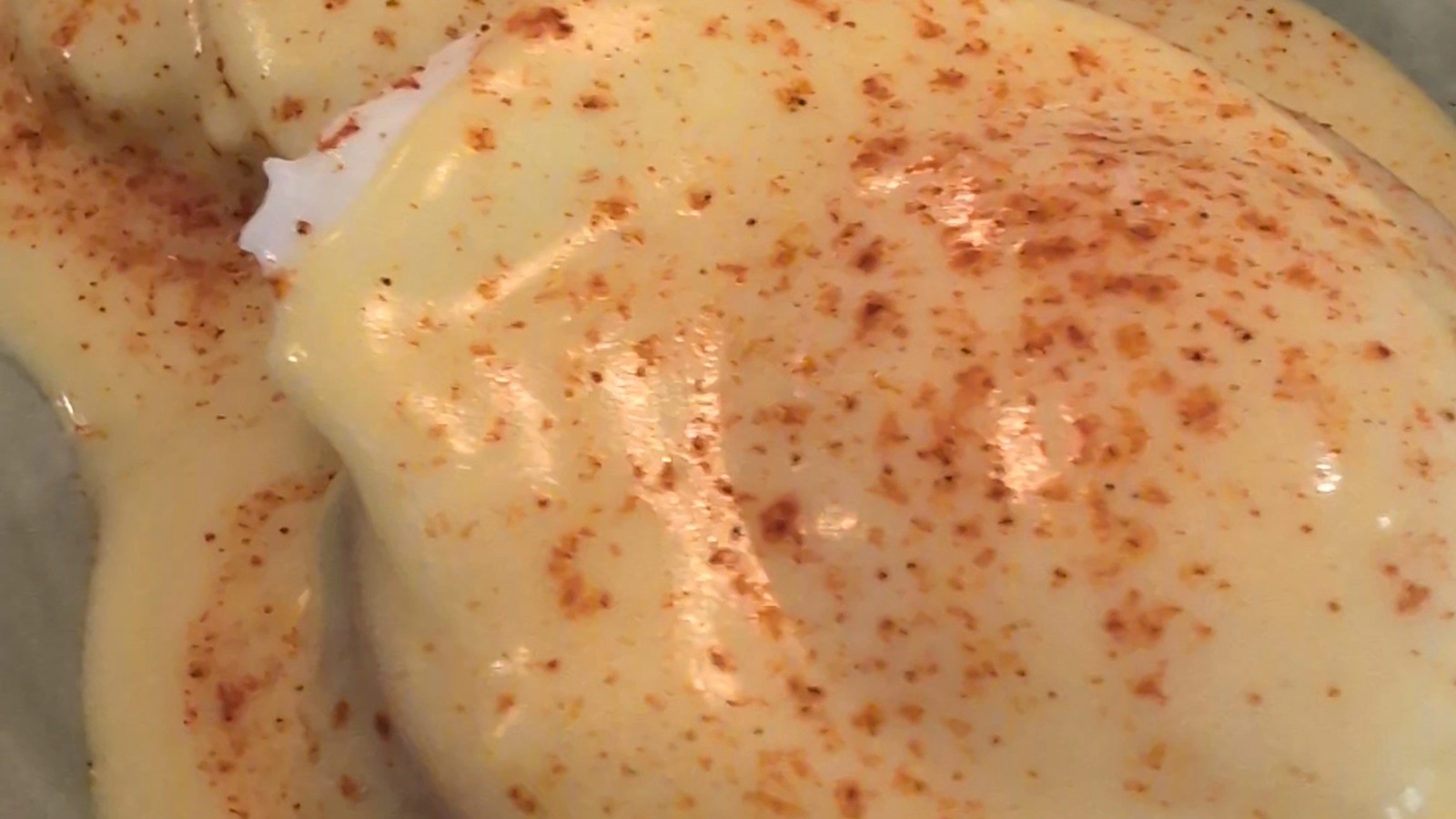 Eggs Benedict with hollandaise and home fries at T.C. Eggington's