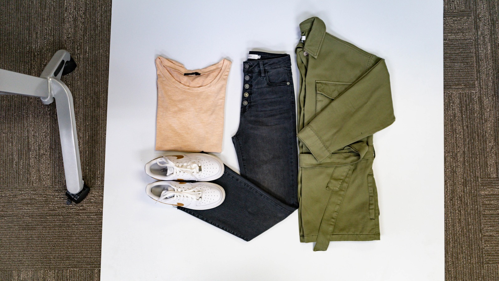 Styled secondhand outfit with sneakers, denim, and a green blazer at Uptown Cheapskate West York