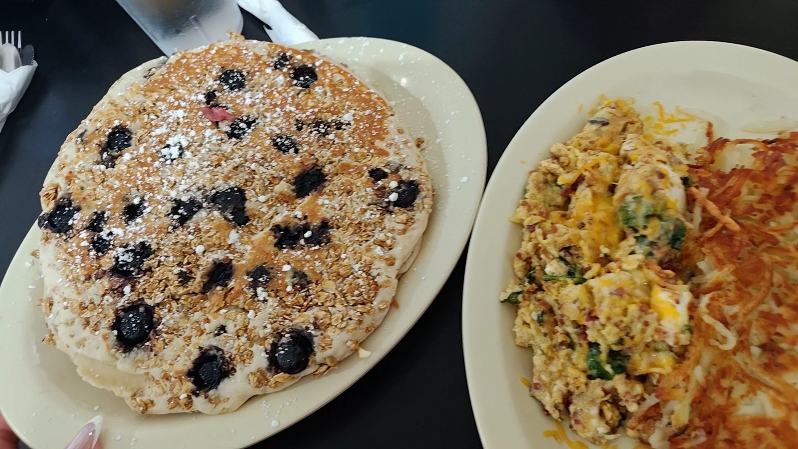 Blueberry pancake with a scramble plate and hashbrowns at Bisbee Breakfast Club