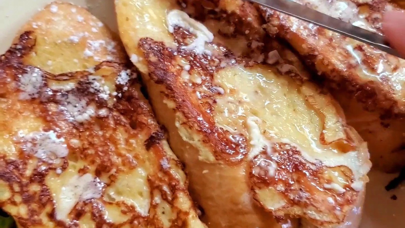 Thick-cut French toast with butter and powdered sugar at Bisbee Breakfast Club