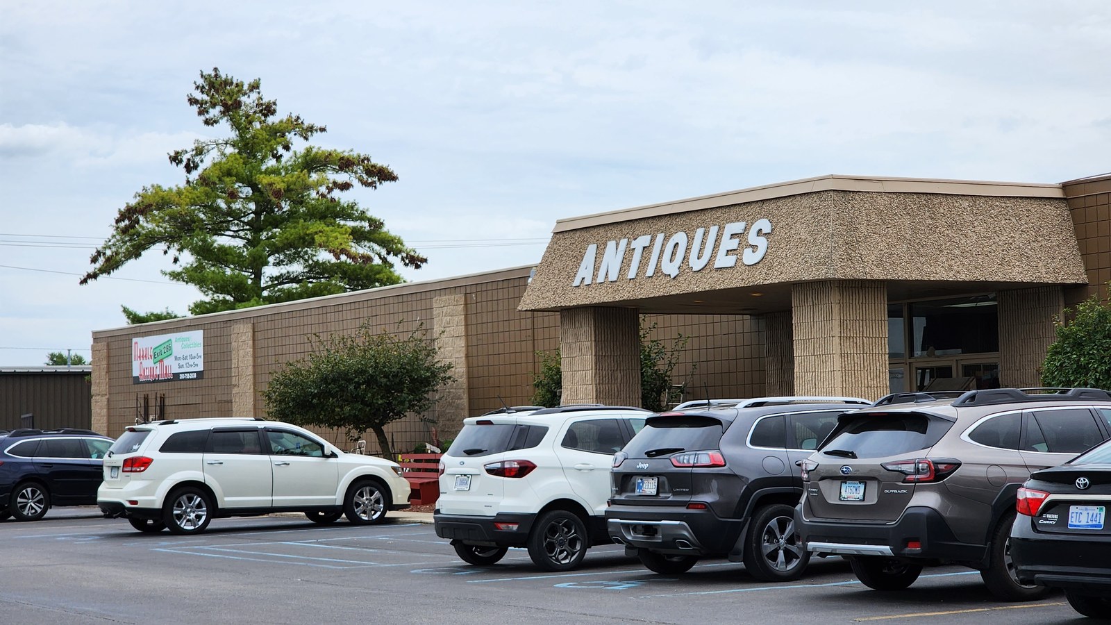 Markle Exit 286 Antique Mall entrance under its large antiques sign in Markle