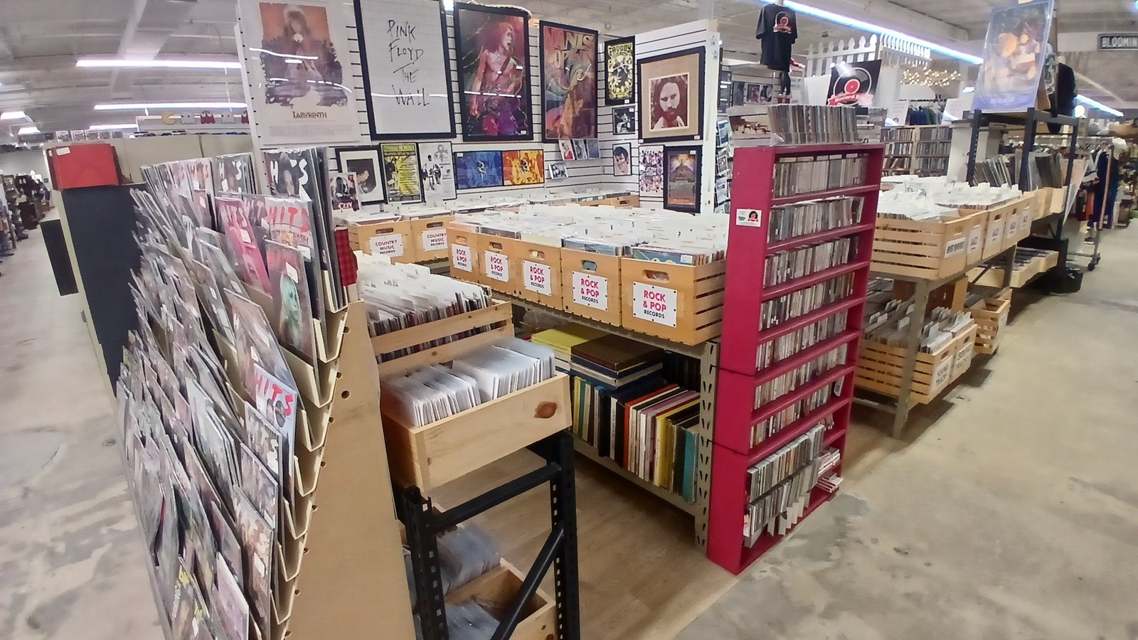 Vinyl records, CDs, and music posters inside America's Antique Mall in Highland