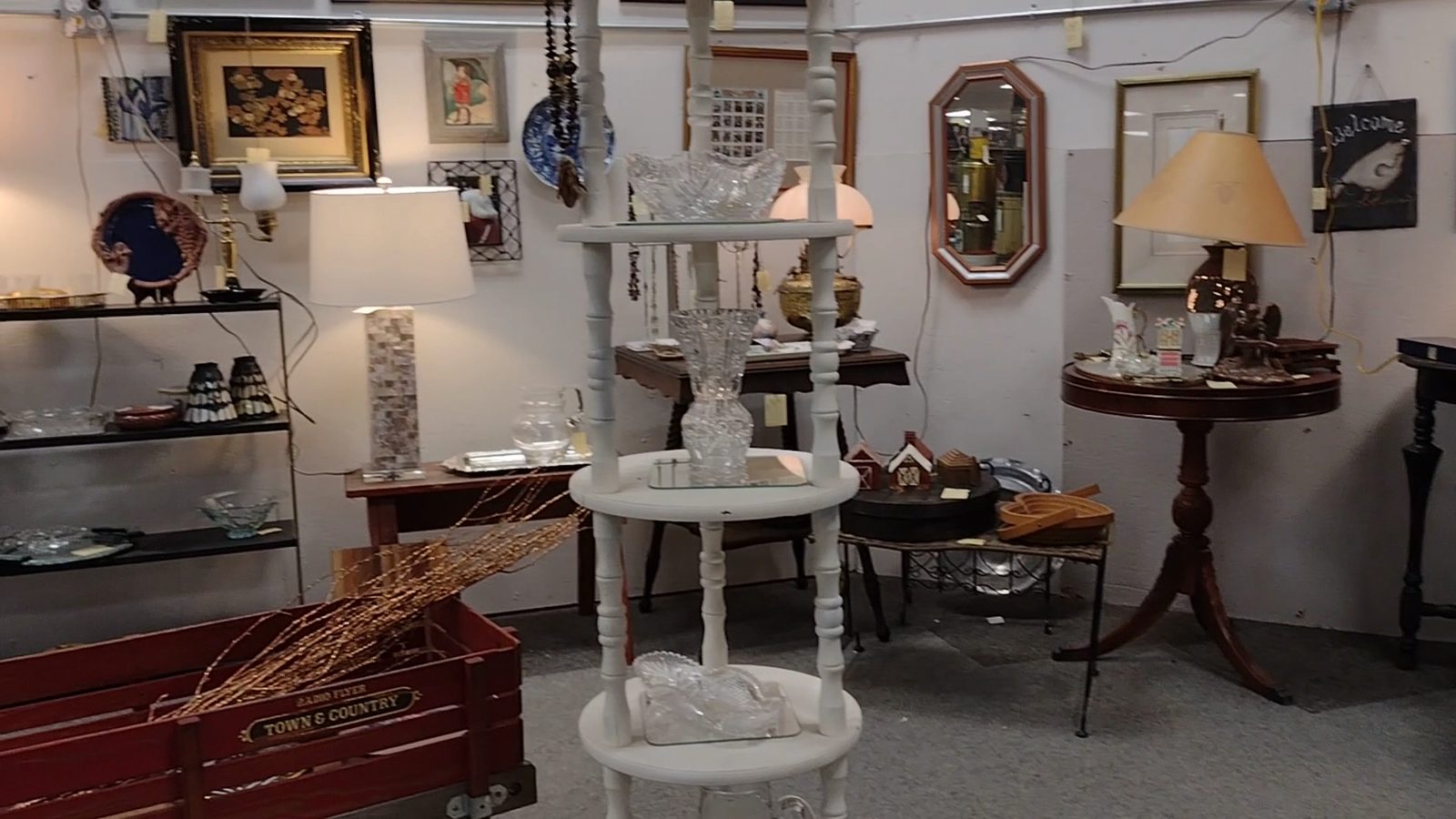 Lamps, silver, and mirrors inside Ohio Valley Antique Mall