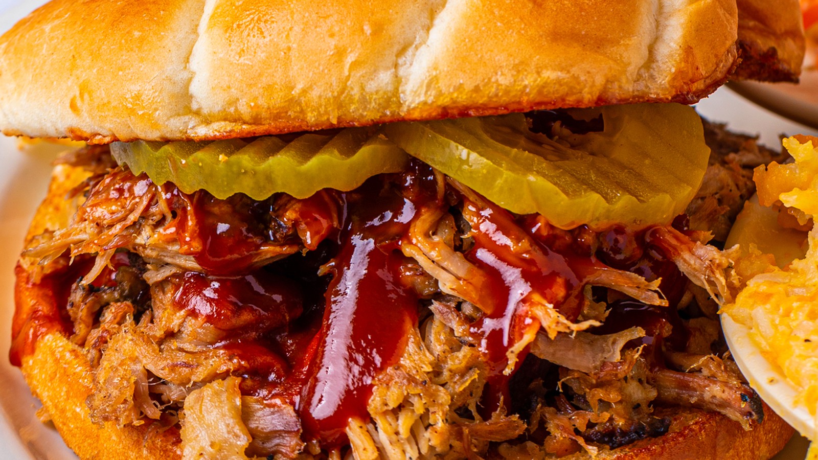 Pulled pork barbecue sandwich with pickles at The Loveless Cafe