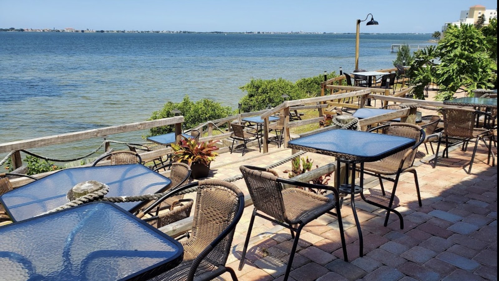 Terraced riverfront patio tables overlooking the Indian River at The Shack in Palm Bay