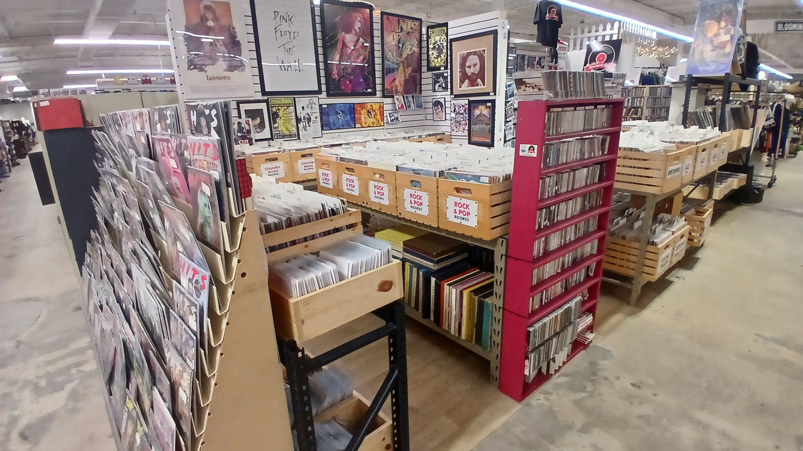 Vinyl records, CDs, and music posters inside America's Antique Mall in Highland