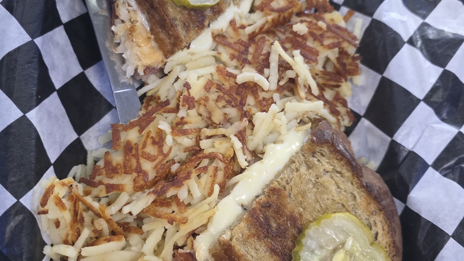 Hash browns and grilled sandwich plate at Mel's Classic Diner in Pigeon Forge