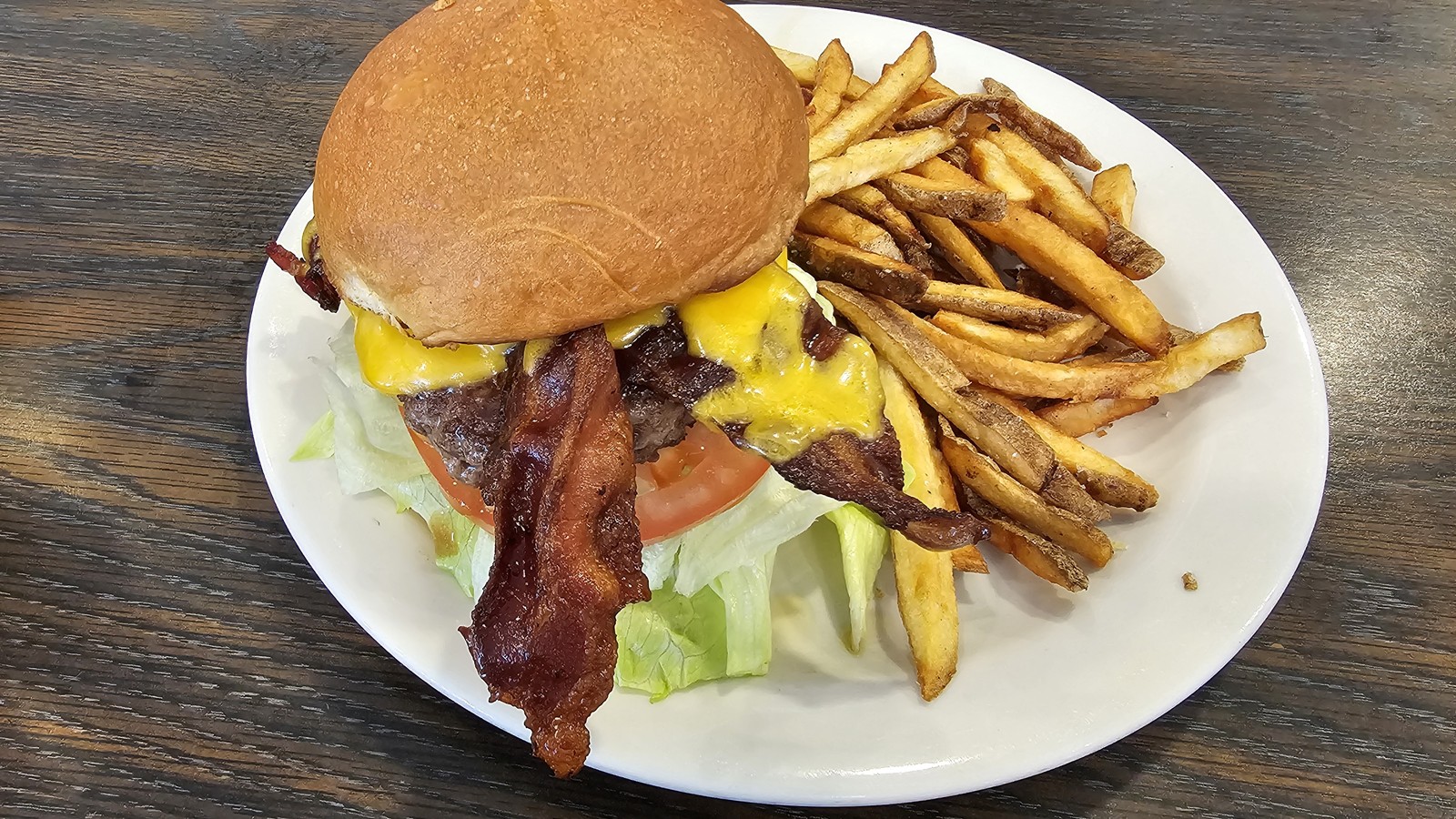 Cheeseburger with bacon and hand-cut fries at Flat Tire Diner