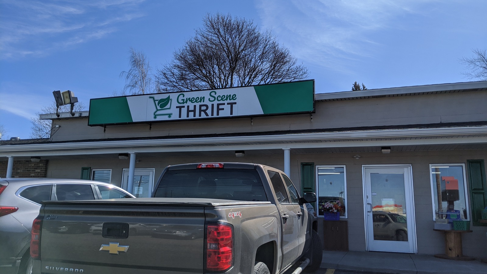 Front windows and entry at Green Scene Thrift Store in Erie