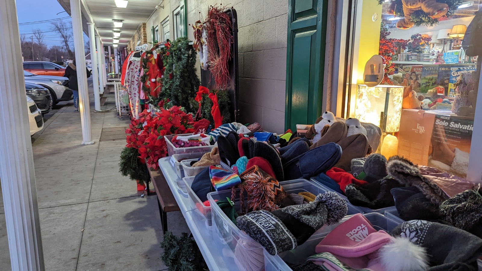 Clothing and seasonal aisle near the front of Green Scene Thrift Store