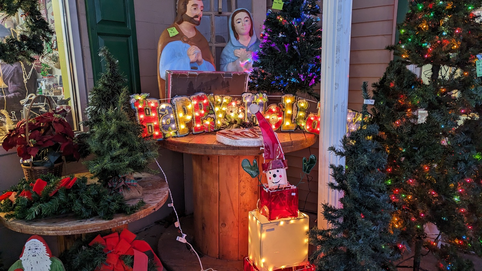 Freebie Friday display and colorful seasonal setup at Green Scene Thrift Store