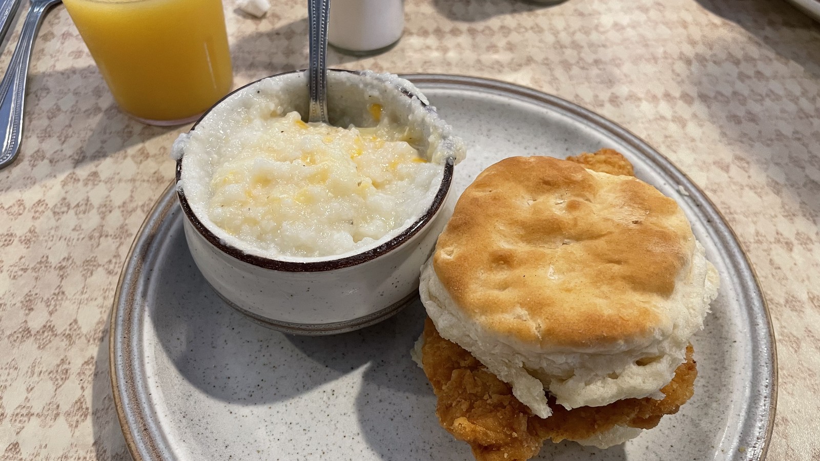 Breakfast plate with biscuit and creamy grits at Trish's Mountain Diner