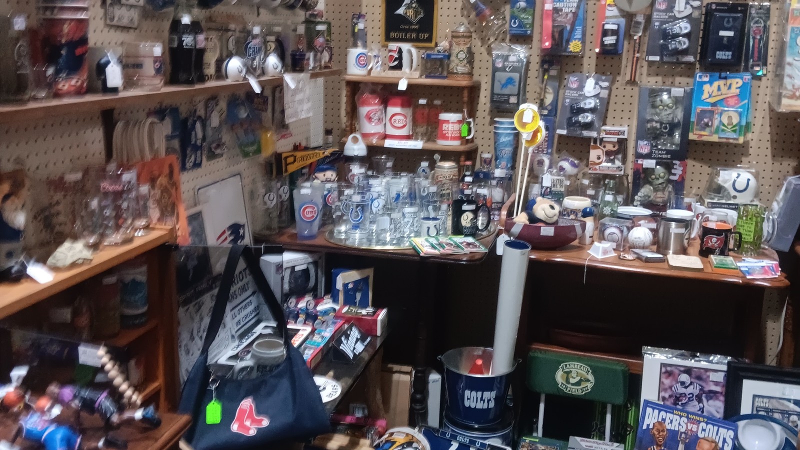 Collectibles wall and display racks inside Treasure Mart Antique Mall