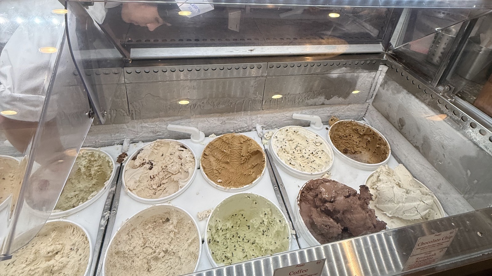 Ice cream tubs and flavor labels in the Leopold's Ice Cream case