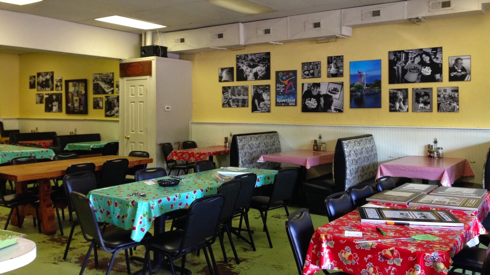 Booths and colorful tables inside Doo-Dah Diner
