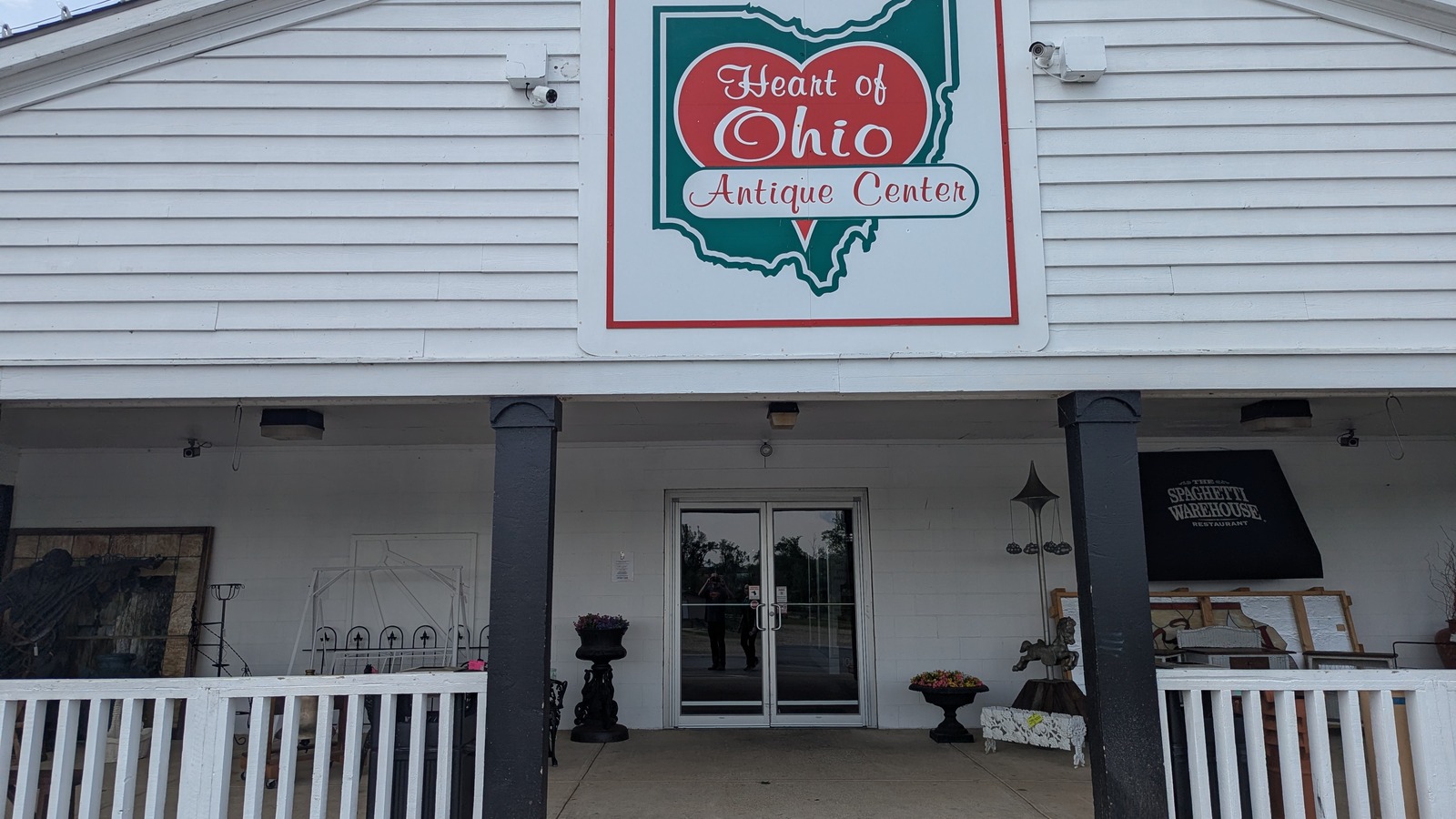 Heart of Ohio Antique Center entrance porch with the large sign above the doors