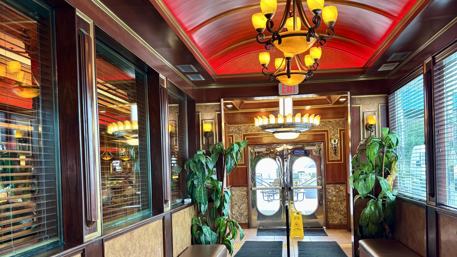 Glowing entry corridor with chandeliers inside Marietta Diner