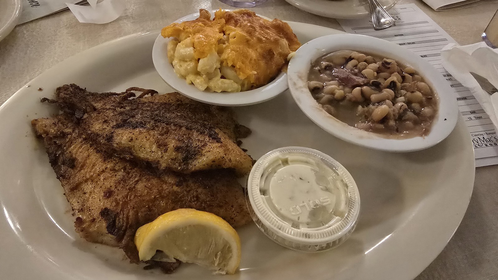 Seasoned catfish with macaroni and cheese and black-eyed peas at Mary Mac's Tea Room