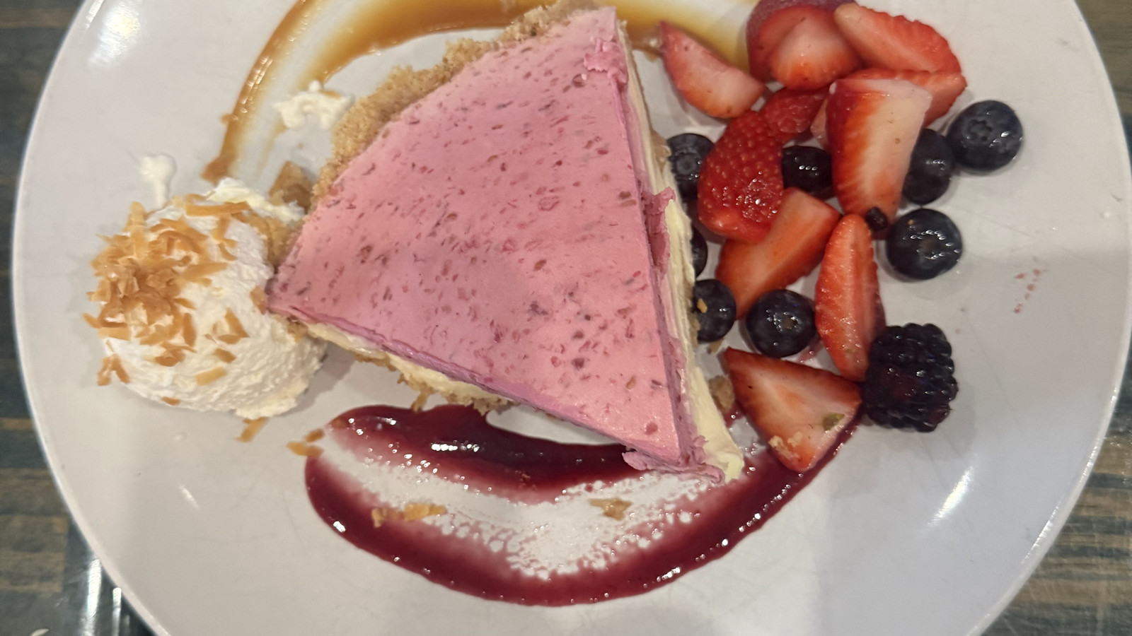 Raspberry key lime pie with berries and toasted coconut at Little Moir's Food Shack