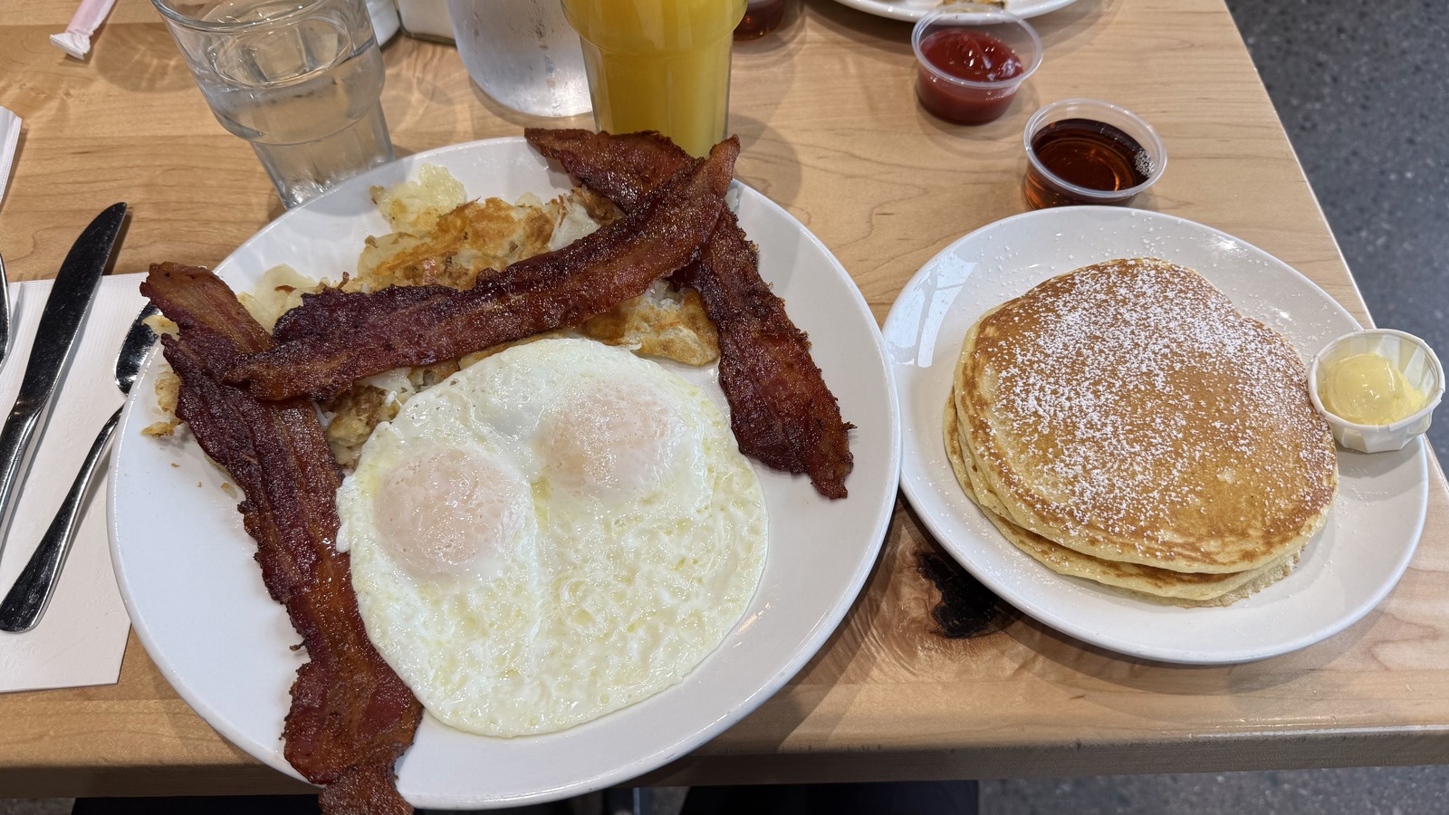 Eggs, bacon, and pancakes at Butters Pancakes & Cafe