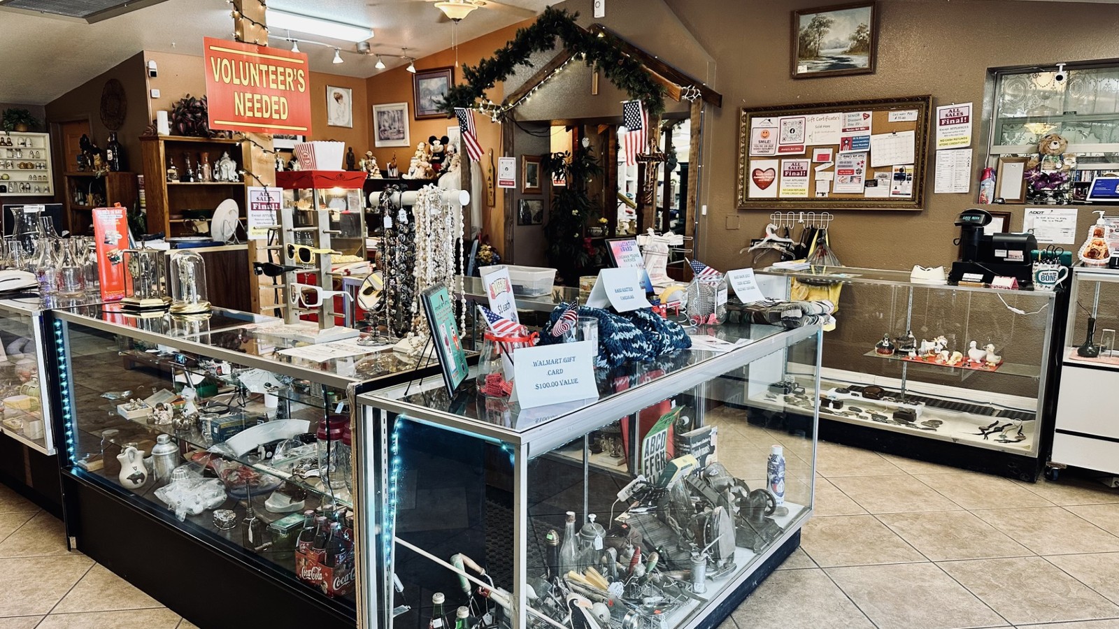 Jewelry and collectibles displayed inside Annie's Thrift Store in Kingman