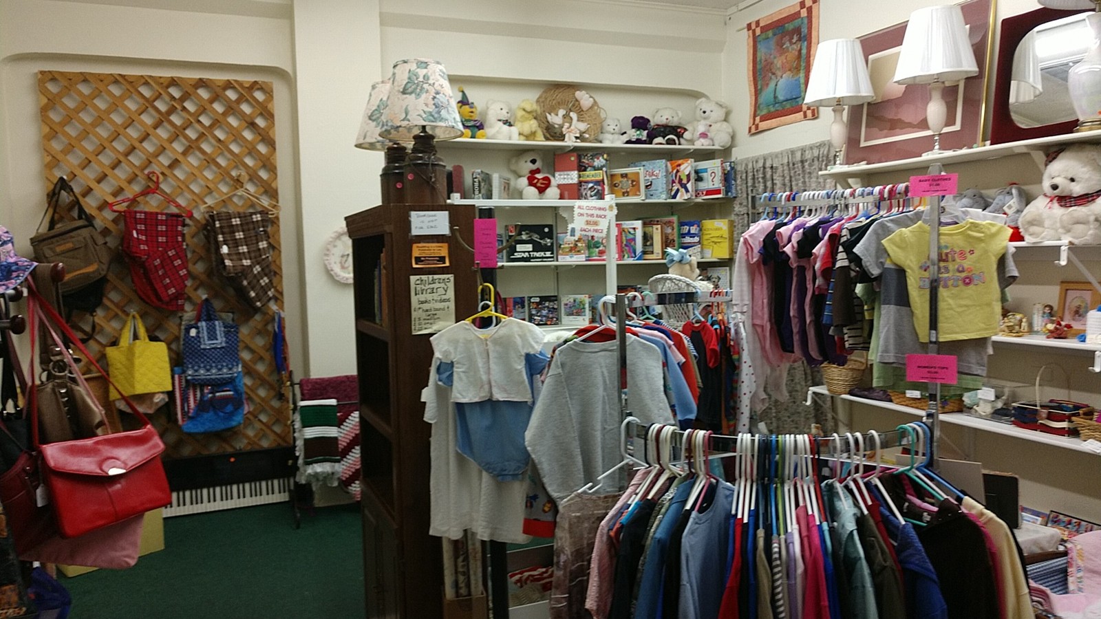 Clothing and small goods at Paws-itively Charming Thrift Store in Kingman