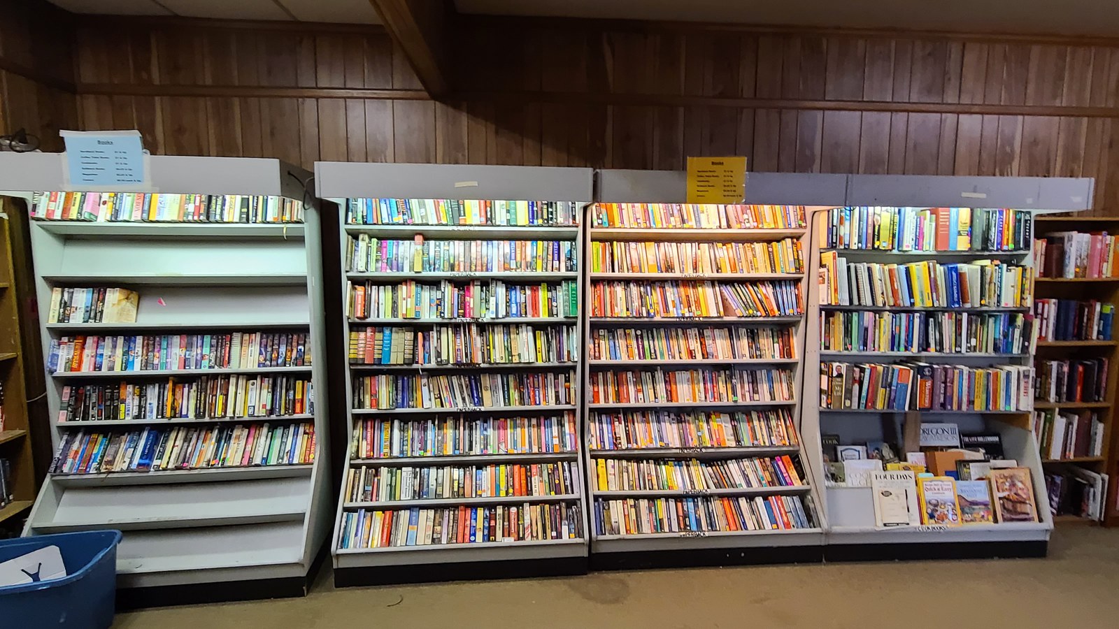 Shelves filled with secondhand books at His House Thrift Shop
