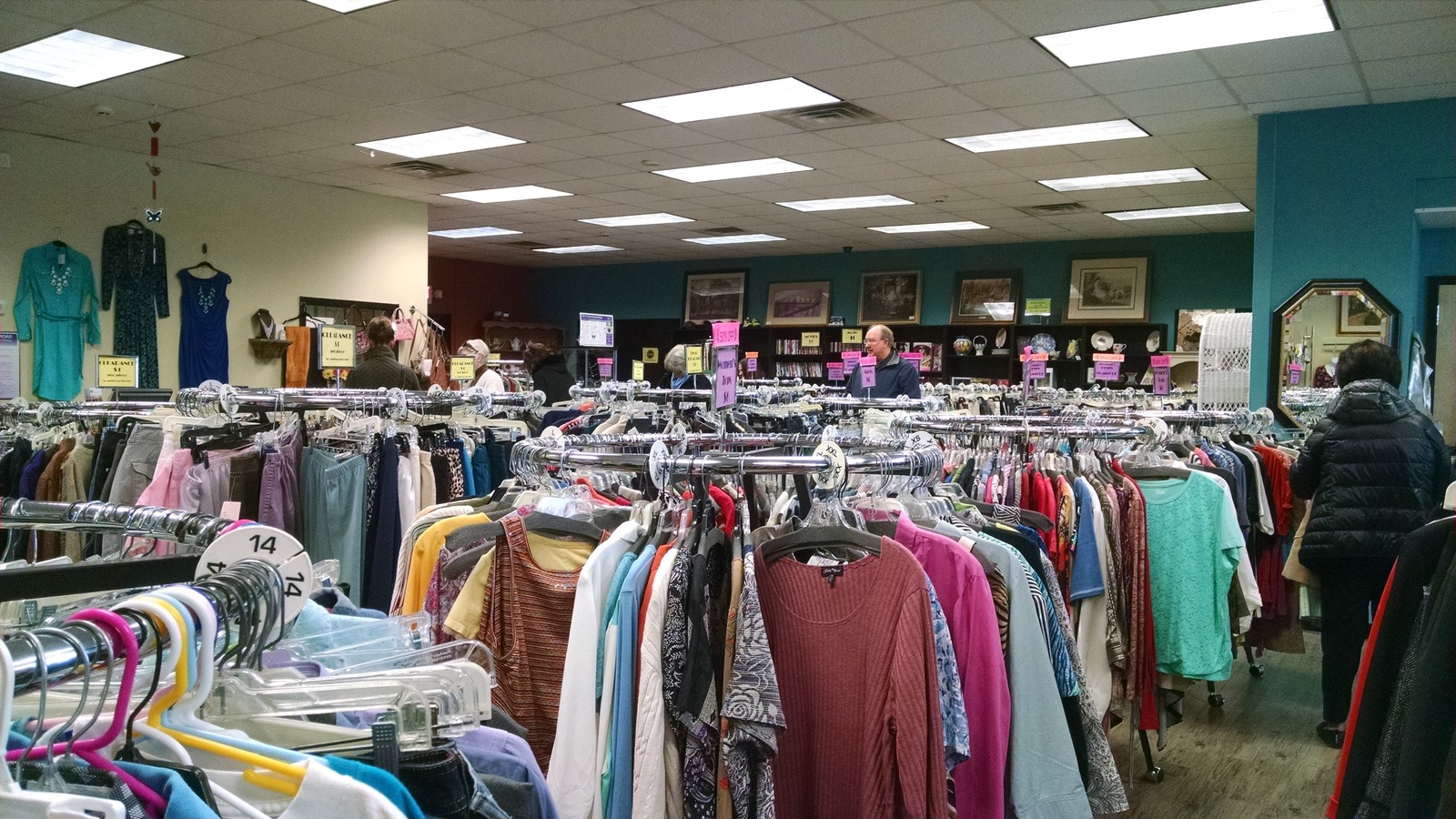 Colorful clothing racks across the sales floor at In Full Swing