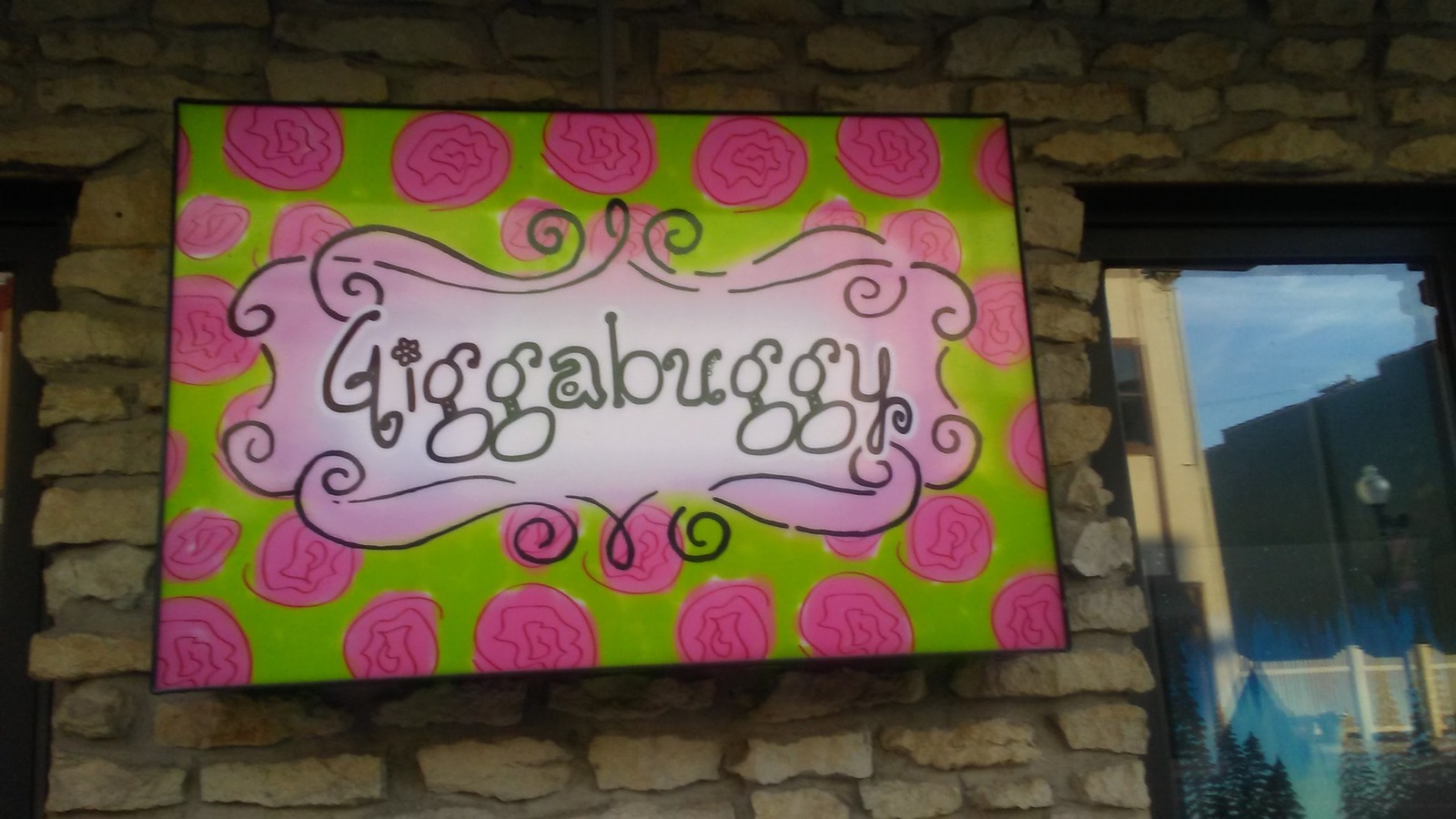 Colorful sign at the Indiana Family Care Center Thrift Store location on Vine Street