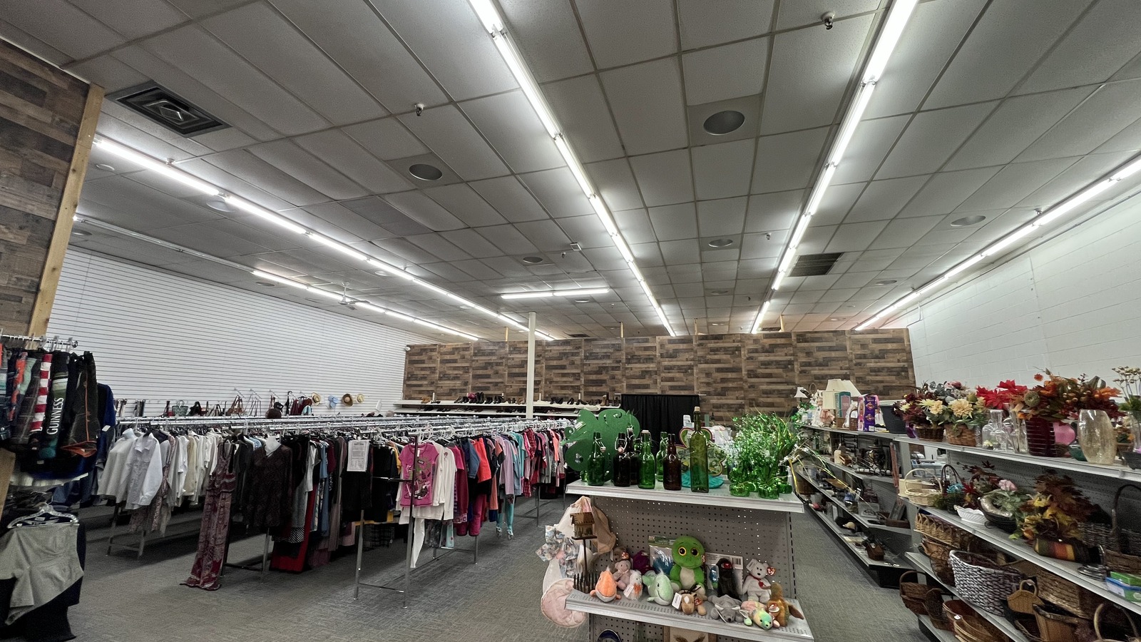 Clothing racks, housewares, and decor across Someplace Safe Fergus Falls Thrift Store